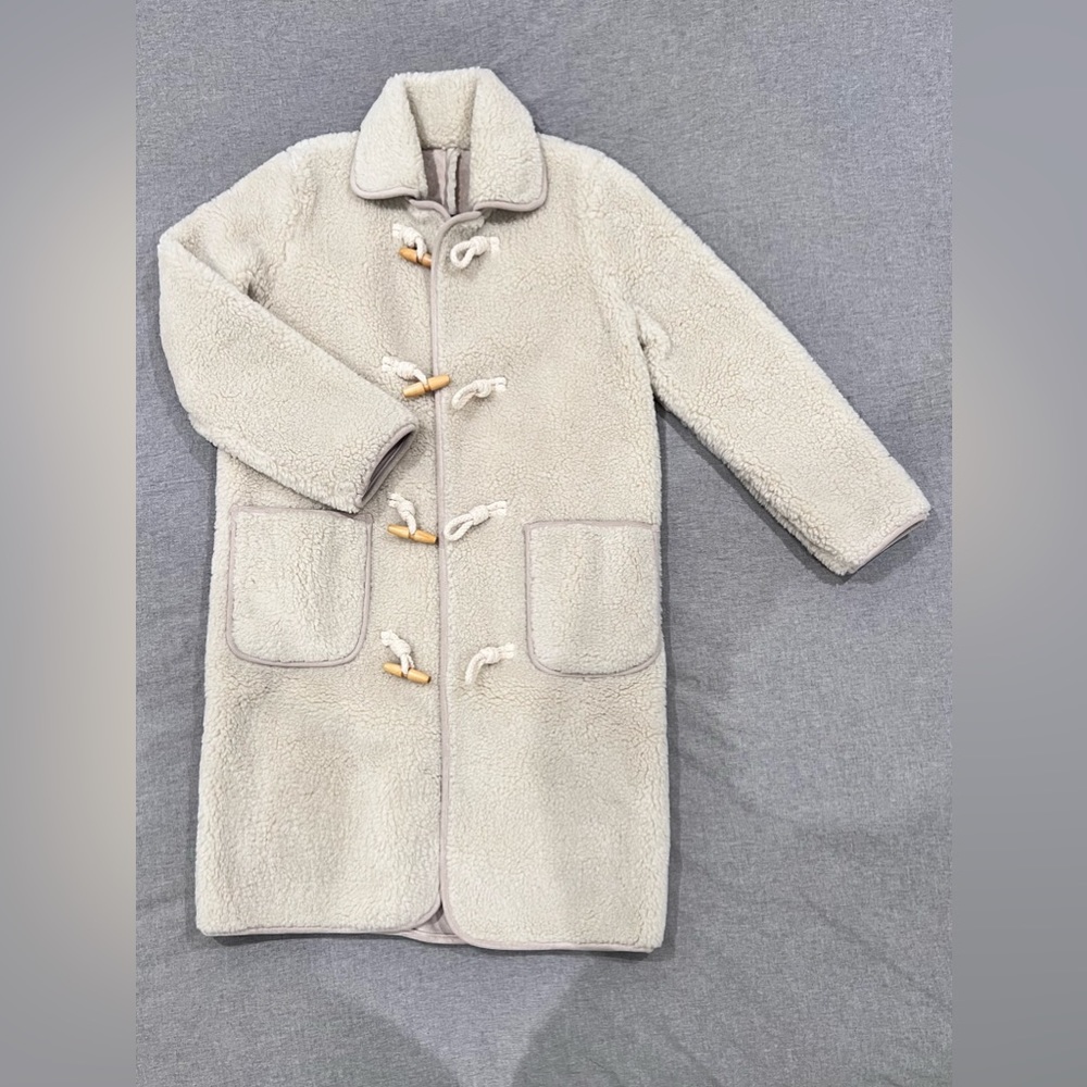 Pixie Market Sherpa Toggle Coat Brand is “floral”